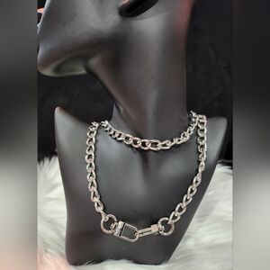 0027. Unbranded 35 1/2" long silver tone chain for handbag